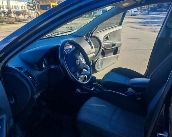 Черный Киа Сид, объемом двигателя 1.4 л и пробегом 200 тыс. км за 5600 $, фото 1 на Automoto.ua
