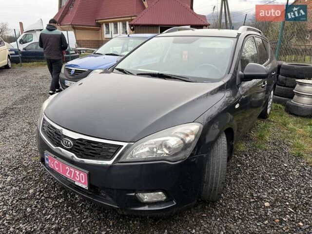 Черный Киа Сид, объемом двигателя 1.4 л и пробегом 220 тыс. км за 5950 $, фото 1 на Automoto.ua