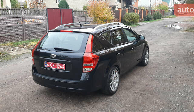 Чорний Кіа Сід, об'ємом двигуна 1.4 л та пробігом 211 тис. км за 6150 $, фото 12 на Automoto.ua