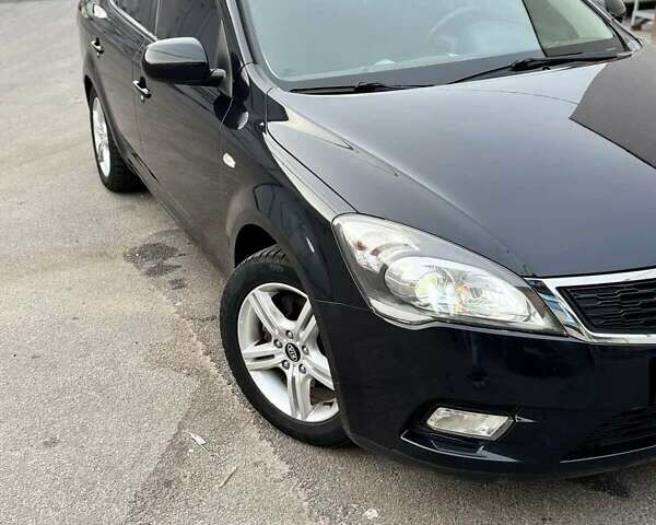 Чорний Кіа Сід, об'ємом двигуна 1.4 л та пробігом 209 тис. км за 6500 $, фото 6 на Automoto.ua