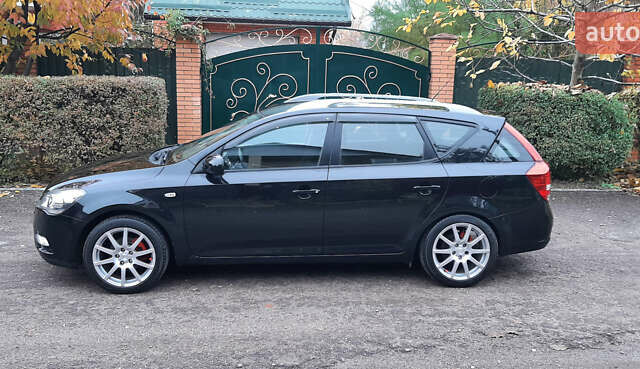 Чорний Кіа Сід, об'ємом двигуна 1.4 л та пробігом 211 тис. км за 6150 $, фото 3 на Automoto.ua