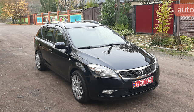 Чорний Кіа Сід, об'ємом двигуна 1.4 л та пробігом 211 тис. км за 6150 $, фото 8 на Automoto.ua