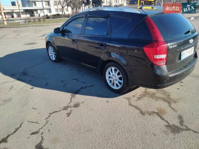 Черный Киа Сид, объемом двигателя 1.4 л и пробегом 200 тыс. км за 5600 $, фото 14 на Automoto.ua