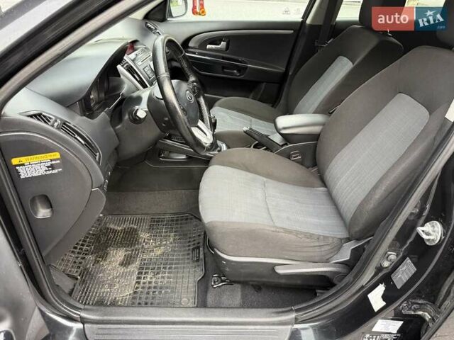 Черный Киа Сид, объемом двигателя 1.4 л и пробегом 220 тыс. км за 5950 $, фото 12 на Automoto.ua