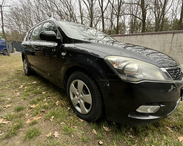 Чорний Кіа Сід, об'ємом двигуна 1.6 л та пробігом 286 тис. км за 6300 $, фото 6 на Automoto.ua