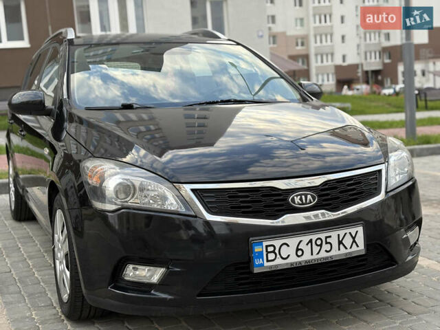 Черный Киа Сид, объемом двигателя 1.4 л и пробегом 206 тыс. км за 5750 $, фото 2 на Automoto.ua