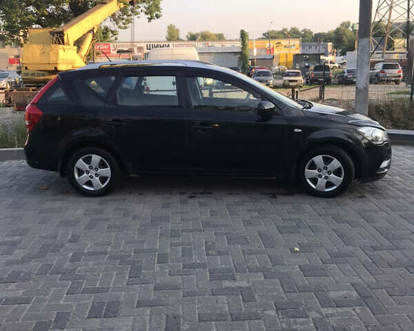 Черный Киа Сид, объемом двигателя 1.6 л и пробегом 240 тыс. км за 7000 $, фото 2 на Automoto.ua
