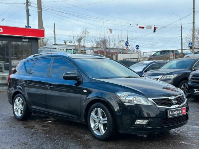 Черный Киа Сид, объемом двигателя 1.4 л и пробегом 209 тыс. км за 6490 $, фото 2 на Automoto.ua