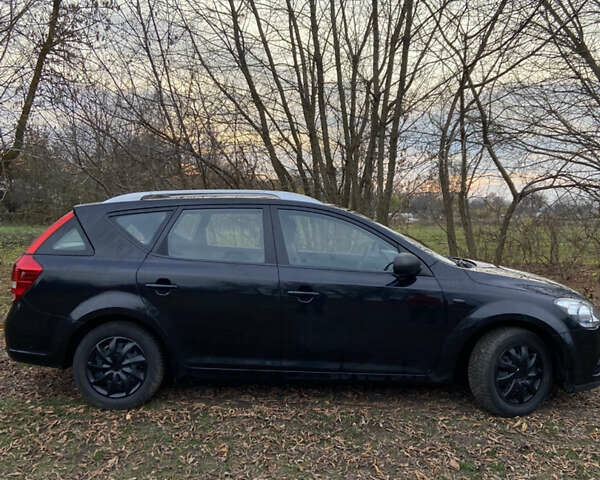 Чорний Кіа Сід, об'ємом двигуна 1.4 л та пробігом 205 тис. км за 6300 $, фото 5 на Automoto.ua