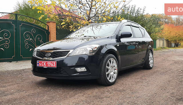 Чорний Кіа Сід, об'ємом двигуна 1.4 л та пробігом 211 тис. км за 6150 $, фото 4 на Automoto.ua