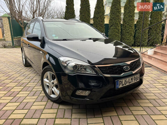 Чорний Кіа Сід, об'ємом двигуна 1.6 л та пробігом 173 тис. км за 7750 $, фото 3 на Automoto.ua