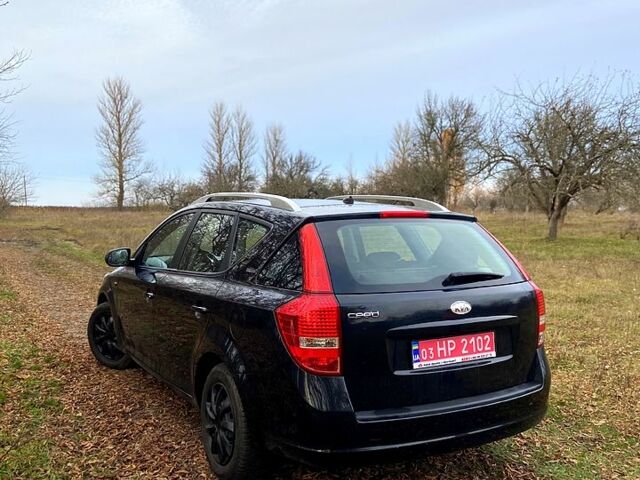 Черный Киа Сид, объемом двигателя 1.4 л и пробегом 205 тыс. км за 6200 $, фото 1 на Automoto.ua