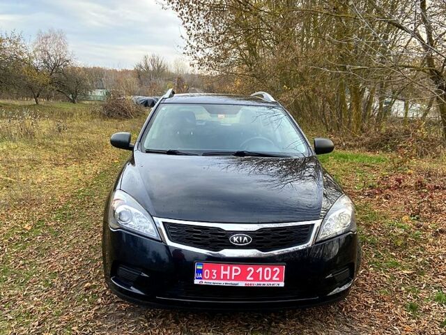 Черный Киа Сид, объемом двигателя 1.4 л и пробегом 205 тыс. км за 6200 $, фото 11 на Automoto.ua
