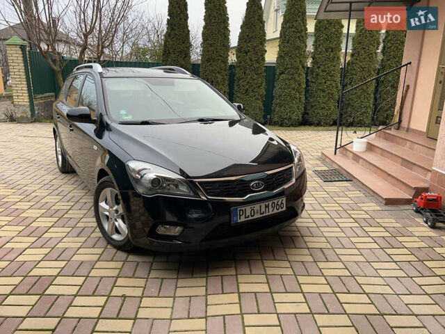 Чорний Кіа Сід, об'ємом двигуна 1.6 л та пробігом 173 тис. км за 7750 $, фото 6 на Automoto.ua