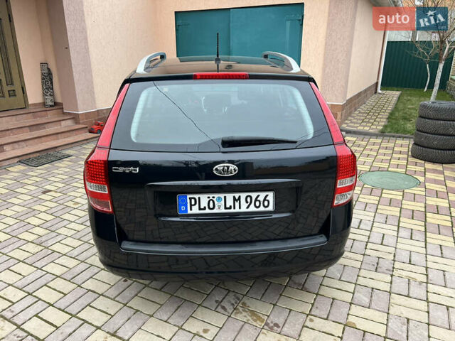 Чорний Кіа Сід, об'ємом двигуна 1.6 л та пробігом 173 тис. км за 7750 $, фото 13 на Automoto.ua