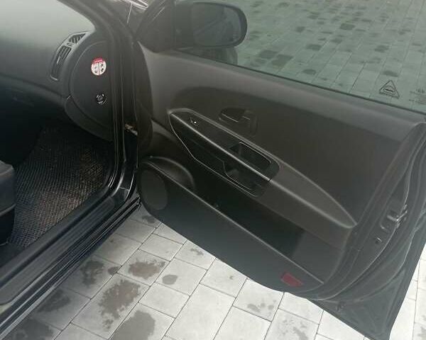 Чорний Кіа Сід, об'ємом двигуна 1.4 л та пробігом 209 тис. км за 6500 $, фото 18 на Automoto.ua