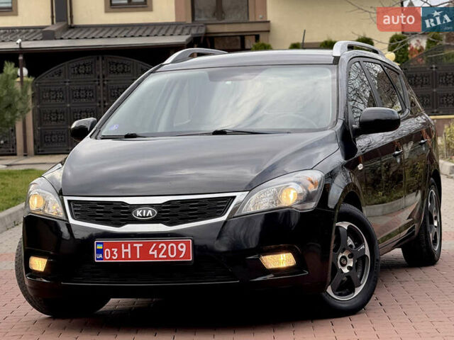 Чорний Кіа Сід, об'ємом двигуна 1.6 л та пробігом 168 тис. км за 7499 $, фото 2 на Automoto.ua