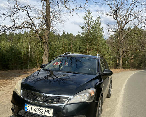 Черный Киа Сид, объемом двигателя 1.58 л и пробегом 194 тыс. км за 7000 $, фото 1 на Automoto.ua