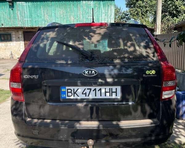 Черный Киа Сид, объемом двигателя 1.58 л и пробегом 300 тыс. км за 7000 $, фото 6 на Automoto.ua