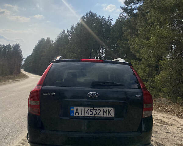 Черный Киа Сид, объемом двигателя 1.58 л и пробегом 194 тыс. км за 7000 $, фото 6 на Automoto.ua
