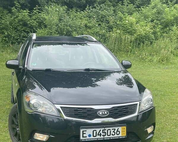 Черный Киа Сид, объемом двигателя 1.4 л и пробегом 150 тыс. км за 5800 $, фото 4 на Automoto.ua
