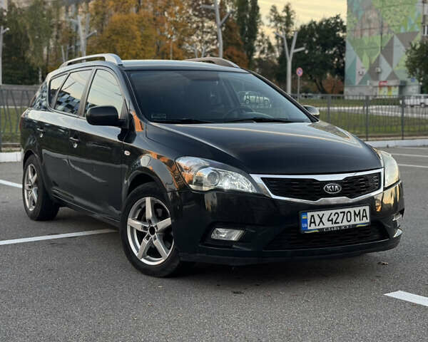 Черный Киа Сид, объемом двигателя 1.58 л и пробегом 280 тыс. км за 7450 $, фото 3 на Automoto.ua
