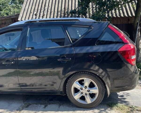Черный Киа Сид, объемом двигателя 1.58 л и пробегом 300 тыс. км за 7000 $, фото 4 на Automoto.ua