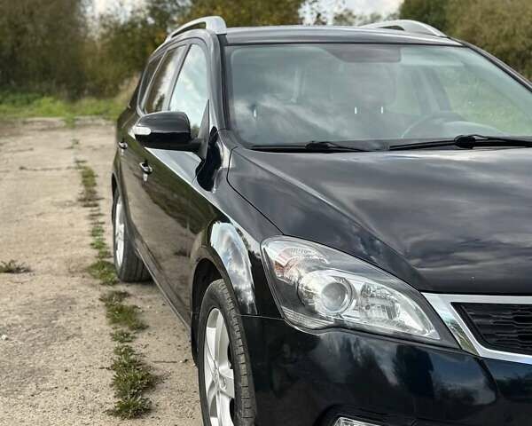 Черный Киа Сид, объемом двигателя 1.58 л и пробегом 158 тыс. км за 7350 $, фото 7 на Automoto.ua