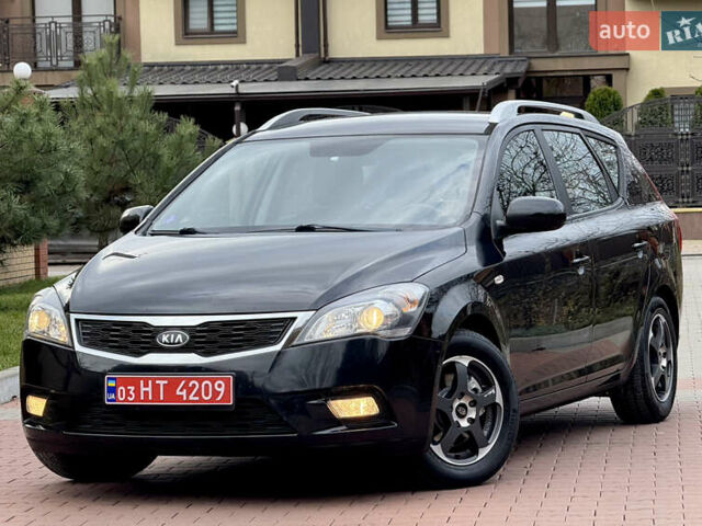 Чорний Кіа Сід, об'ємом двигуна 1.6 л та пробігом 168 тис. км за 7499 $, фото 5 на Automoto.ua