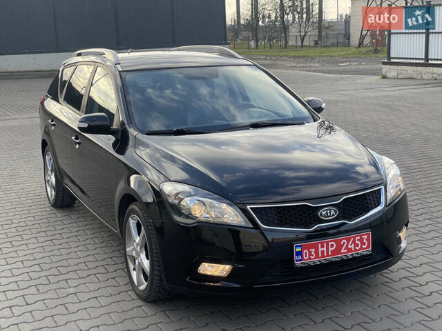 Черный Киа Сид, объемом двигателя 1.6 л и пробегом 168 тыс. км за 7700 $, фото 14 на Automoto.ua