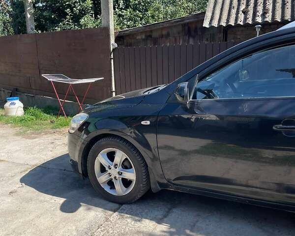 Черный Киа Сид, объемом двигателя 1.58 л и пробегом 300 тыс. км за 7000 $, фото 3 на Automoto.ua
