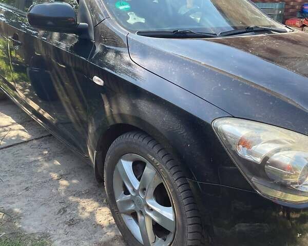Черный Киа Сид, объемом двигателя 1.58 л и пробегом 300 тыс. км за 7000 $, фото 2 на Automoto.ua