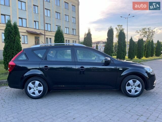 Чорний Кіа Сід, об'ємом двигуна 1.4 л та пробігом 116 тис. км за 6599 $, фото 1 на Automoto.ua