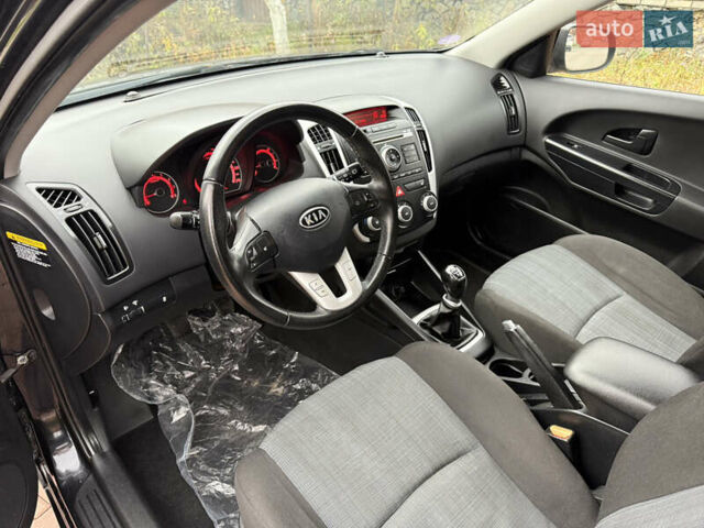 Чорний Кіа Сід, об'ємом двигуна 1.6 л та пробігом 168 тис. км за 7499 $, фото 44 на Automoto.ua