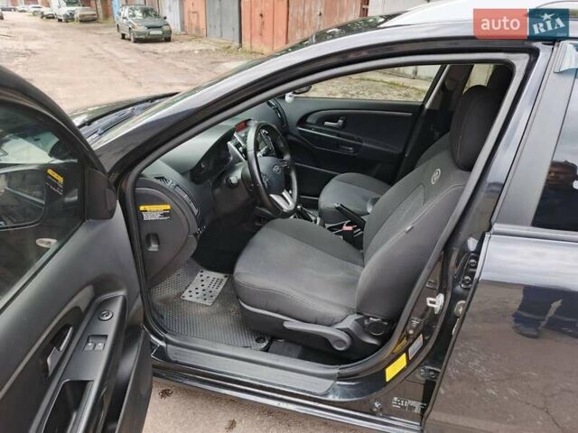 Чорний Кіа Сід, об'ємом двигуна 1.58 л та пробігом 365 тис. км за 6200 $, фото 5 на Automoto.ua