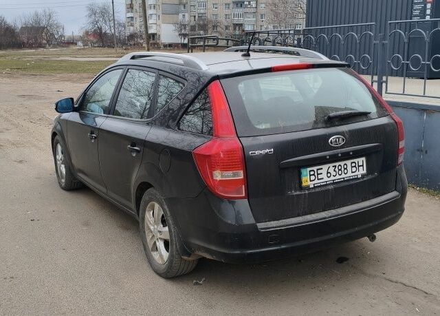 Черный Киа Сид, объемом двигателя 1.6 л и пробегом 144 тыс. км за 10154 $, фото 3 на Automoto.ua