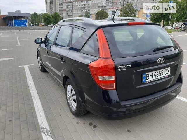 Чорний Кіа Сід, об'ємом двигуна 1.4 л та пробігом 209 тис. км за 6600 $, фото 4 на Automoto.ua