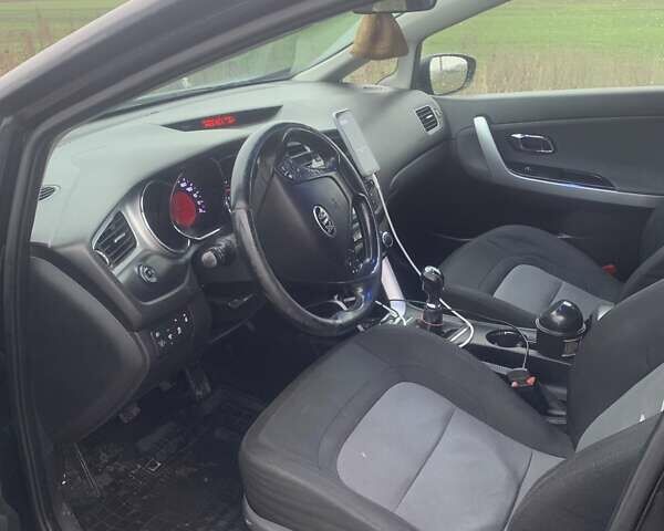 Черный Киа Сид, объемом двигателя 1.58 л и пробегом 340 тыс. км за 8200 $, фото 5 на Automoto.ua