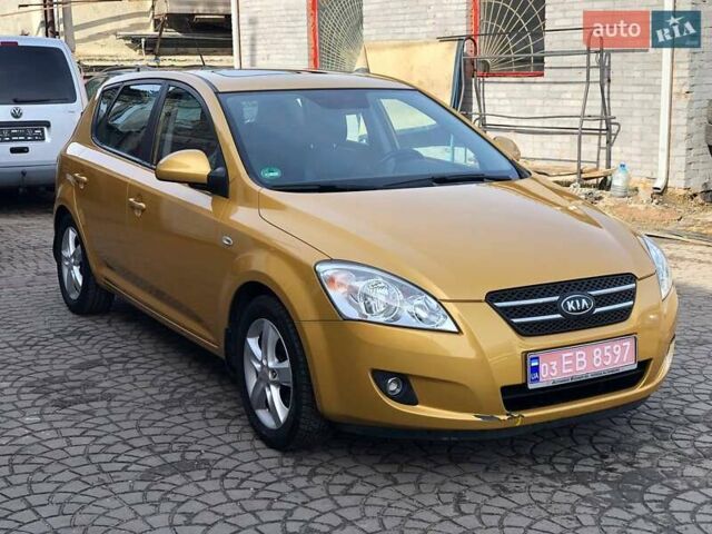 Желтый Киа Сид, объемом двигателя 2 л и пробегом 139 тыс. км за 6500 $, фото 1 на Automoto.ua
