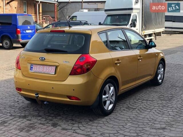 Желтый Киа Сид, объемом двигателя 2 л и пробегом 139 тыс. км за 6500 $, фото 2 на Automoto.ua