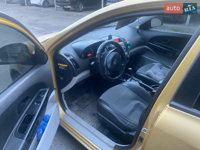 Желтый Киа Сид, объемом двигателя 1.59 л и пробегом 199 тыс. км за 5500 $, фото 9 на Automoto.ua