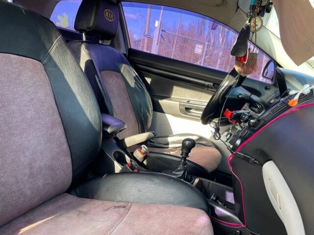 Жовтий Кіа Сід, об'ємом двигуна 1.4 л та пробігом 258 тис. км за 5400 $, фото 13 на Automoto.ua