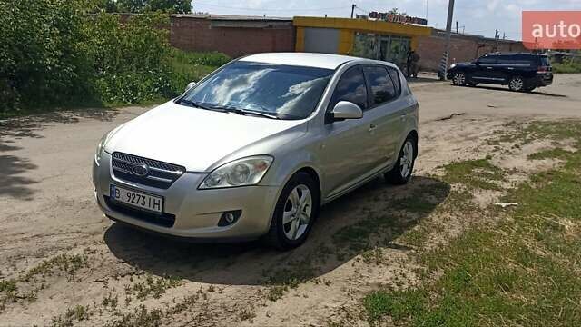 Серый Киа Сид, объемом двигателя 1.58 л и пробегом 255 тыс. км за 4800 $, фото 5 на Automoto.ua