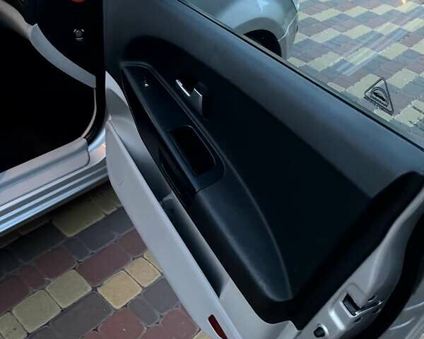 Серый Киа Сид, объемом двигателя 2 л и пробегом 136 тыс. км за 7250 $, фото 13 на Automoto.ua