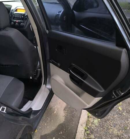 Сірий Кіа Сід, об'ємом двигуна 1.4 л та пробігом 233 тис. км за 4590 $, фото 14 на Automoto.ua