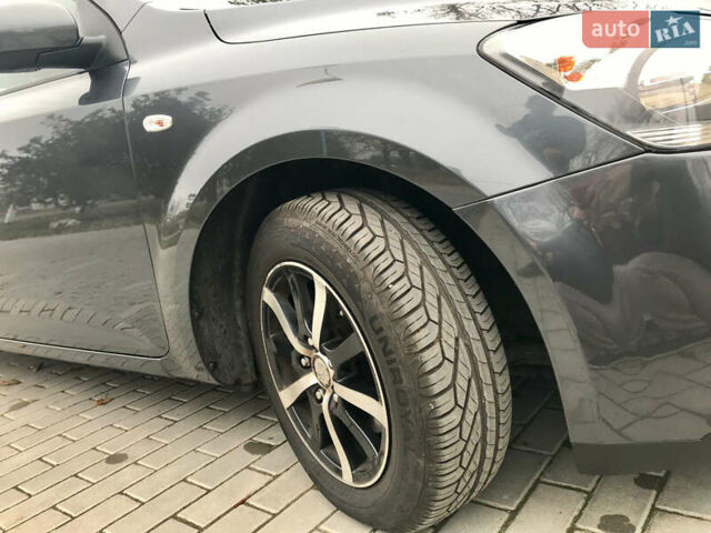 Серый Киа Сид, объемом двигателя 1.59 л и пробегом 155 тыс. км за 6690 $, фото 4 на Automoto.ua