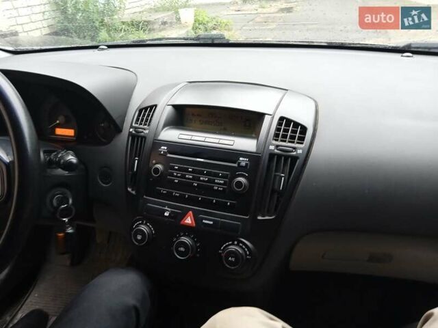 Серый Киа Сид, объемом двигателя 1.4 л и пробегом 55 тыс. км за 7000 $, фото 3 на Automoto.ua