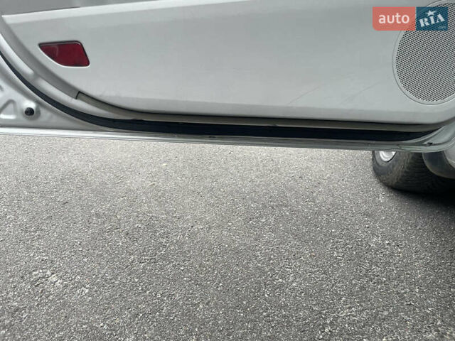 Серый Киа Сид, объемом двигателя 1.59 л и пробегом 256 тыс. км за 5850 $, фото 24 на Automoto.ua