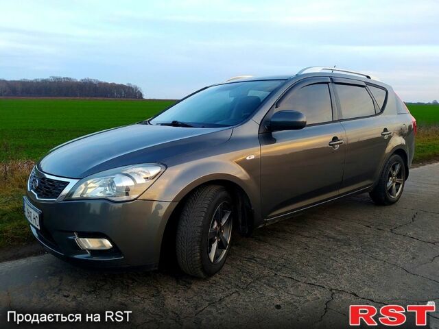 Серый Киа Сид, объемом двигателя 1.4 л и пробегом 227 тыс. км за 5800 $, фото 4 на Automoto.ua