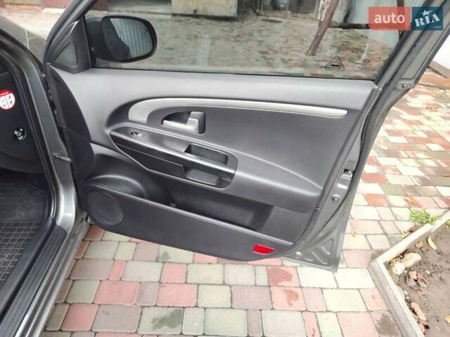 Серый Киа Сид, объемом двигателя 1.58 л и пробегом 241 тыс. км за 5700 $, фото 9 на Automoto.ua